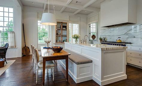 Beautiful white kitchen with marble counters and backsplash with island and long bench seat Kitchen Island Bench Seating, Kitchen Island Booth, Kitchen Island With Bench Seating, Kitchen Island Table Combo, Beautiful White Kitchens, Bench Seating Kitchen, White Marble Kitchen, Kitchen Island Bench, Kitchen Island Table