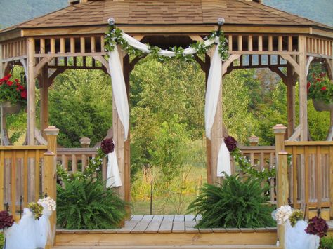 Decorated gazebo for wedding. khimaira farm wedding venue Shenandoah Valley Blue Ridge Mountains Luray VA Wedding Venue Gazebo, Gazebo Drapes Wedding, Wooden Gazebo Wedding, Wedding Photos Gazebo, Gazebo Wedding Ceremony Budget-bride.shop, Archway Decor, Gazebo Wedding Decorations, Rustic Wedding Foods, Gazebo Decorations