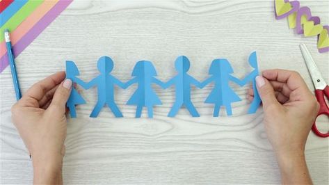 3 Ways to Make a Paper People Chain - wikiHow Paper People Chain, Morning Basket, Birthday Cake Pops, Paper People, Paper Chains, Handprint Crafts, Holiday Calendar, Cute Notes