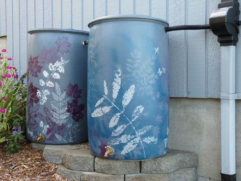 2 Decorative rain barrels Decorating Rain Barrels, Rain Barrel Cover Ideas, Rain Barrel Painting, Painted Rain Barrels Ideas, Rain Barrel Painting Ideas, Painted Rain Barrels, Barrel Garden Ideas, Painted Barrels, Decorative Rain Barrels