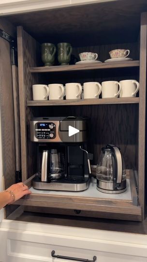 96 reactions | We’re looking forward to our morning coffee from the time our heads hit the pillow the night before! This perfect little coffee bar is stained to be cohesive with the floor, has reachable access with the slide out shelf, another shelf for coffee cups plus the doors tuck away neatly. Perfect enclosed coffee bar situation 😍☕️ #coffeebardecor #coffeestation | Woods Design House | Northeast Houston Interiors | eats.travels · i just needed a holiday 🌴 Cubby Hole, Coffee Station, Folding Doors, Kitchen Makeover, Cubbies, Coffee Bar, Wood Design, Morning Coffee, Kitchen Renovation