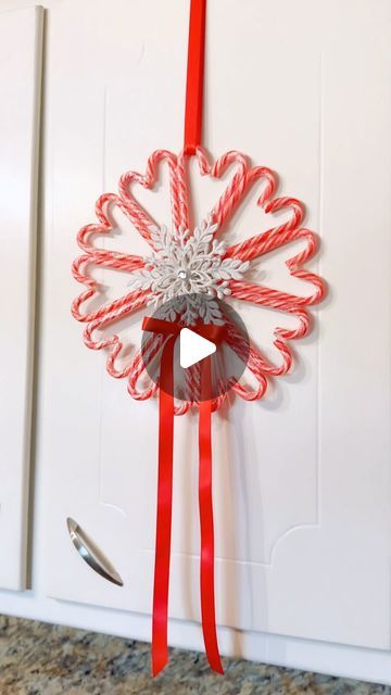 Melanie Ferguson•DIY Home Decorating on Instagram: "You’ll be amazed at how easy and simple it is to make this candy cane wreath with all Dollar Tree supplies! 🙌  Perfect for kitchen cabinets, windows, and even framed! 🎄  ✅ Comment “CANDY CANE” to see all the details!  #candycanes #candycanechristmas #candycanewreath #christmaswreaths #peppermintcandy" Candy Cane Wreath Diy, Candy Cane Crafts, Kitchen Christmas, Candy Cane Wreath, Christmas Hacks, Diy Candy, Peppermint Candy, Christmas Candy Cane, Home Decorating