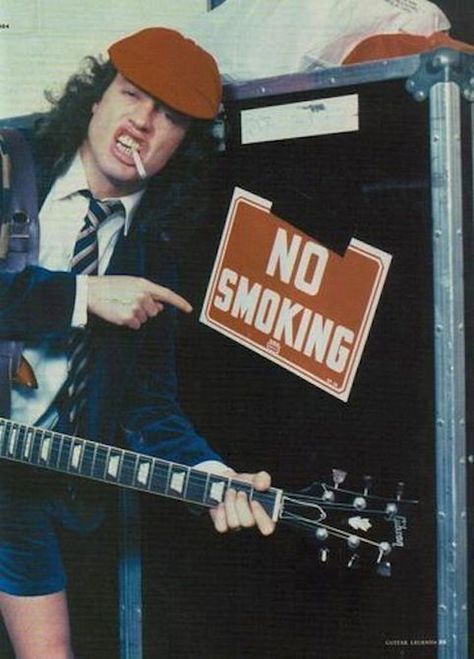 Angus Young -- breaking the rules! (Smoking is a classic way to do this!) Classic Rock Aesthetic, Acdc Angus Young, Breaking The Rules, Rock Aesthetic, Rock Band Posters, Rockstar Aesthetic, Band Poster, Rock Vintage, Angus Young