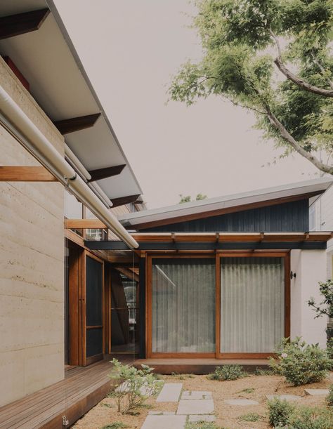 This Accessible Home Beautifully Channels Japanese Architecture Australian Architecture Residential, Modern Japanese House Exterior, Genkan Entrance, Upstate House, Accessible Home, Street Appeal, Modern Japanese Architecture, Timber Staircase, Coastal Architecture