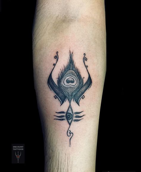 Trishul signifying as lord shiva and peacocks feather as lord Krishna Krishna And Shiva Together Tattoo, Krishna Shiva Tattoo, Shiv Krishna Tattoo, Shiv And Krishna Together Tattoo, Shiva And Krishna Tattoo, Shiva And Krishna Together, Krishna Tattoo Design For Men, Lord Krishna Tattoo Design, Krishna Tattoo Design