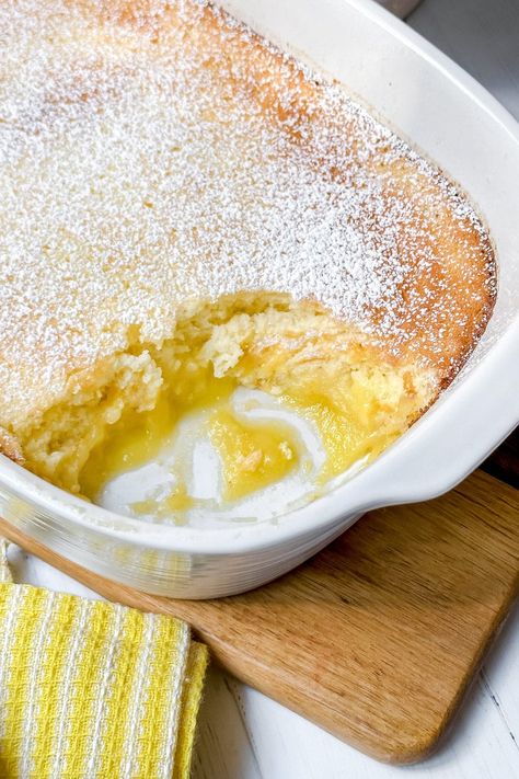 Baked Lemon Pudding is a delicious, irresistibly light and airy dessert with Irish origins. A sweet, effortless treat you don't want to miss. Irish Lemon Pudding, Lemon Delicious Pudding Dessert Recipes, Lemon Cake Pudding, Sticky Lemon Pudding, Lemon Delicious Pudding, Warm Pudding Recipes, Puddings Easy Desserts, Lemon Recipes Dessert, Light Desserts Recipes Healthy