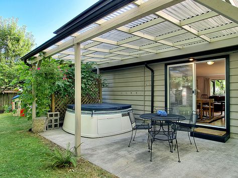 Need to make my patio cover this nice.  Even with the same plastic corrugated sheets, mine looks outdated. Corrugated Plastic Roofing, Patio Trellis, Covered Patio Design, Fibreglass Roof, Corrugated Roofing, Pergola Attached To House, Patio Cover, Backyard Pergola, Pergola With Roof