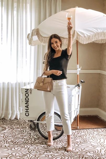 Champagne Tasting at El Encanto’s Chandon Pop-Up Tasting Escape! I paired a black puff sleeve top with white jeans and added a fun summer heel for a spring outfit and summer outfit. My top is sold out, but I’ve linked similar options. http://liketk.it/3dPxK #liketkit @liketoknow.it #LTKstyletip #LTKshoecrush #LTKunder100 #springoutfit #summeroutfit #jeans #winetasting #champagne #puffsleeves Beige Puff Sleeve Top For Brunch, Chic White Puff Sleeve Top With Ruffles, Chic Spring Puff Sleeve Button-up Top, Spring Brunch V-neck Puff Sleeve Top, White Trendy Puff Sleeve T-shirt, Black Puff Sleeve Top, Champagne Tasting, Champagne Taste, Summer Heels