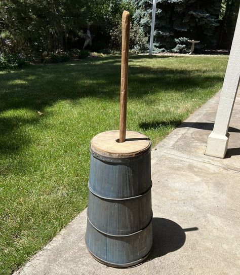 Have you recently discovered an antique butter churn in your garage and want to know how much it could be worth? Do you have a keen interest in antiques and are curious about the differences between antique wooden butter churns and stoneware butter churns? Antiques are fascinating items and provide us with tangible links to the past. They are an insight into how people lived and can be a very lucrative investment How To Decorate An Old Butter Churn, Antique Butter Churn, Red Wing Stoneware, Wood Butter, Butter Churns, Butter Churn, Wooden Paddle, Churning Butter, Antique Collectors