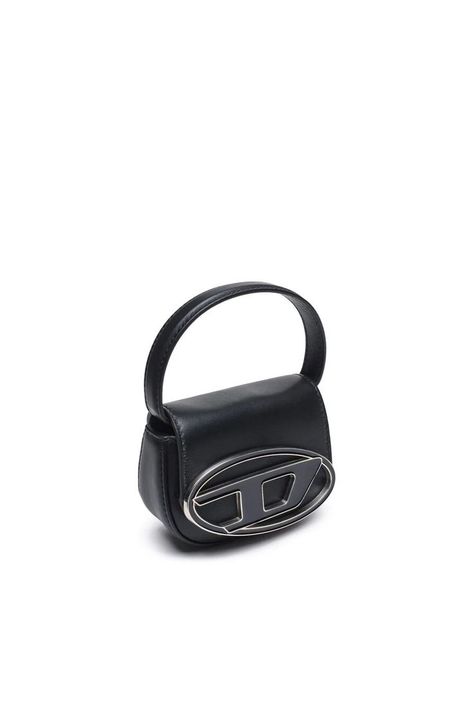 Diesel-Iconic mini bag with D logo plaque Product details: A highly coveted design, this women's minibag is built from soft nappa leather. The iconic metal oval D plaque on the flap in tonal enamel makes this accessory instantly recognisable. Wear it crossbody or as a tiny handbag. Product Page is in the link. Btw, my team and I are on a mission to introduce best products from brands everyday, and you can shop from the collection of the best! Checkout the link. Diesel Bag, Diesel Store, D Logo, Mini Crossbody, Nappa Leather, Leather Mini, Cow Leather, Official Store, Mini Bag