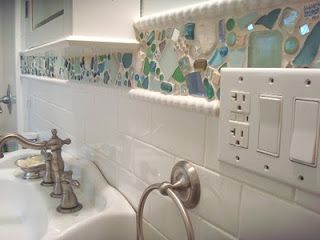 Another look at the lovely sea glass border in the bathroom. Sea Glass Tile, Glass Tile Backsplash, Coastal Bathrooms, Glass Backsplash, Bathroom Redo, Backsplash Tile, Beach Bathrooms, Kitchen Tiles Backsplash, Beach Glass