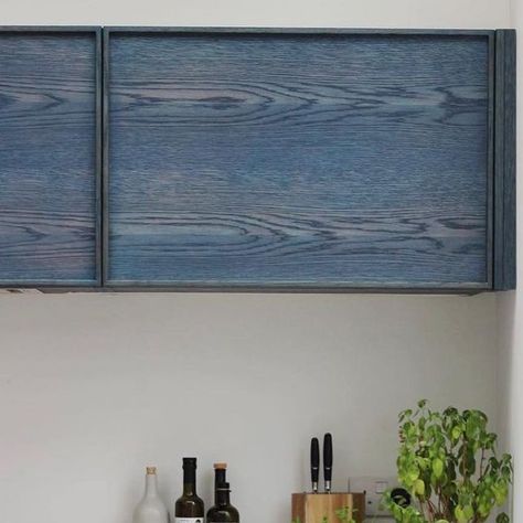 Jon Grant London | Furniture on Instagram: "Throwback to one of our previous kitchen projects: oak veneer fronts with solid oak edges finished in Rubio Monocoat ‘Midnight Indigo’ stain. We love unordinary colour choice by our customers and how the stain has exposed beautiful grain & knots in the wood. If you are looking for something similar and would like to get a quote- get in touch with us at studio@jongrant.london Worktop by @koliqimarbleltd #handmadefurniture #madeinleyton #madeinlond Colour Stained Wood, Blue Stained Wood Cabinets, Blue Plywood Kitchen, Dyed Plywood, Plywood Closet, Indigo Interiors, Plywood Furniture Design, Stained Wood Kitchen, Blue Wood Stain