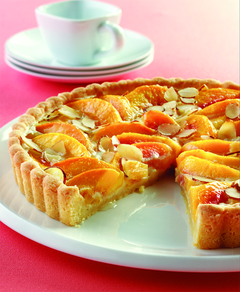 This delicate peach tart combines an almond-flavored crust with fresh peaches, cream and sliced almonds. Peach Custard, Peach Tart Recipes, Custard Tarts Recipe, Peach Tart, Peach Desserts, Custard Tart, Land O Lakes, Tart Recipe, Peach Recipe