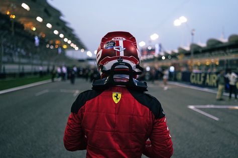 Back of Charles Leclerc of Scuderia Ferrari in his helmet and race suit on the grid. Wallpaper Formula 1, Belgium Grand Prix, Escuderias F1, Bahrain Grand Prix, Singapore Grand Prix, Canadian Grand Prix, Mclaren Formula 1, Australian Grand Prix, F1 Wallpaper Hd