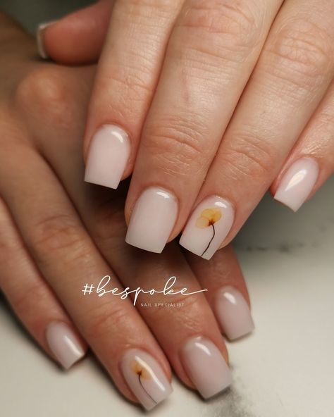 Short sqaure milky white nails with watercolor nail art flower. Milky White Nails With Flowers, Watercolor Nail Art, Watercolor Nails, Milky White Nails, Nail Art Flower, Small Flower Design, Water Color Nails, White Nail Designs, Neutral Nails