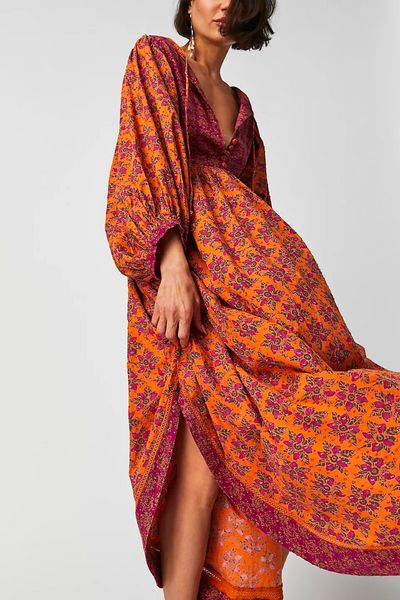 Free People Launched a "Daisy Jones" Collection | The Everygirl Bohemian Long Dress, Bohemian Punk, Gardener Aesthetic, Beach Holiday Dresses, Boho Festival Fashion, Daisy Jones, Dress Pockets, Sunset Orange, Boho Aesthetic