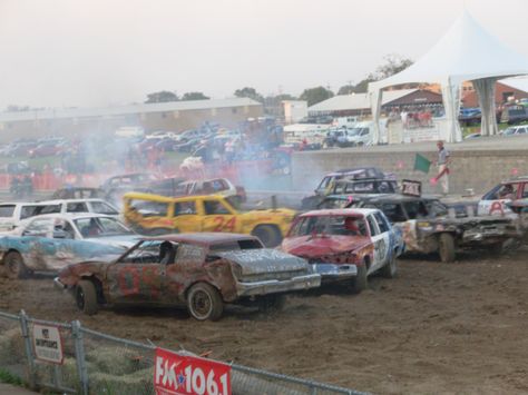 The Walworth County Fair traditionally ends with a mash-em, smash-em, pile-em demolition derby. Various heats of cars last through the evening until the final car stands. Crumpled doors, steaming radiators, smoke and even the occasional car fire are par for the course. Derby Car Ideas Demolition, Powderpuff Derby Cars, Demolition Derby Quotes, Crash Bash, Steam Radiators, Kobra Kid, Demolition Derby Cars, Demo Derby, Amador County