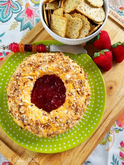 Pecan Cheddar Cheese Ring with Strawberry Preserves | Rosalynn Carter’s vintage appetizer recipe for a pecan and cheddar cheese ring with a slight hint of heat with strawberry preserves in the center served with crackers. Cheese Ring With Strawberry Preserves, Rosalynn Carter, Cheese Ring, South Your Mouth, Raspberry Preserves, Strawberry Preserves, Strawberry Jelly, Cheese Ball Recipes, Appetizer Bites