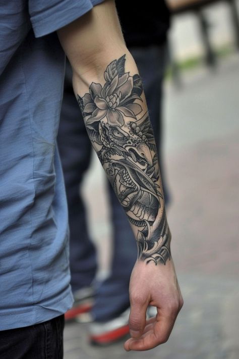 Explore the best meaningful forearm tattoo ideas for men with designs that carry deep significance. Masculine Arm Tattoos, Forarm Tattoos Mens Creative, Front Of Forearm Tattoo, Forearm Sleeve Tattoos For Men, Forearm Tattoo Men Sleeve Unique, Tattoo Ideas For Men Meaningful, Tattoo Sleeves For Men, Men Sleeve Tattoo, Traditional Tattoo Arm