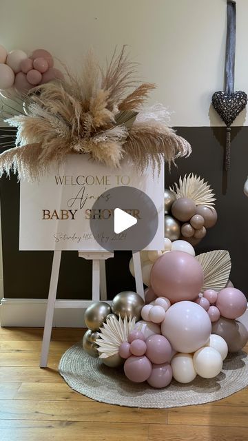 Marley & Nusha Events on Instagram: "Ajar’s baby shower   We went with a boho luxe feel for the displays.   From the ripple sailboard with glowing neon sign & fluffy pampas.   To the welcome sign with its luxurious 3D lettering and soft pink hues.   Did you spot my new gold floral plinths?  Perfect for mini pampas displays.   And soft satin orbz with chiffon ribbon were placed around the venue to create height.   .  .  .  #marleyandnusha #balloons #balloondisplay #balloonstylist #balloonstyling #organicballoons #ohbaby #neonsign #babyshower #boho #bohobabyshower #babyshowerballoons #babyballoons #eventdecor #sailboarddisplay #eventstyling #leeds #bradford #huddersfield #wakefield #westyorkshireballoons" Welcome To My Baby Shower Sign, Boho Balloon Columns, Boho Theme Baby Shower Ideas, Welcome Sign Balloon Garland, Pink Boho Baby Shower Ideas, Mauve Baby Shower Ideas, Floral Plinths, Pink And Gold Baby Shower Ideas, Baby Shower Floral Theme