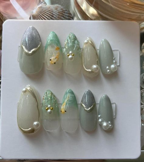 This Acrylic & Press On Nails item by EnchantedNailTips has 21 favorites from Etsy shoppers. Ships from Riverside, CA. Listed on Aug 4, 2024 Lily Pad Nail Art, Fish Themed Nails, Aquarium Nail Art, Jelly Fish Nails Art, Minimalist Nail Art Designs Simple, Coral Reef Nails, Lily Pad Nails, Nails With Fish, Otter Nails