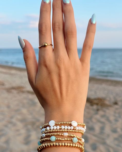 Arm candy & bracelet stacks all day✨🤍 Whether you’re a gold girl or like to add pops of color into your stack we’ve got you covered! Make your dream stack and shop all these bracelets on our website, link in bio💌 🤍 🤍 🤍 🏷️ Dainty beaded bracelet stack, gold jewelry trends, fall nails, vanilla girl aesthetic, clean girl accessories, pearl jewelry, handmade charm bracelets, handmade jewelry, coastal granddaughter aesthetic, fall outfit inspo, arm candy, small jewelry business, beach girl aesth... Nails Vanilla, Bracelet Stack Gold, Small Jewelry Business, Coastal Granddaughter Aesthetic, Aesthetic Fall Outfit, Granddaughter Aesthetic, Vanilla Girl Aesthetic, Beaded Bracelet Stack, Arm Candy Bracelets