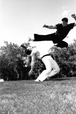 Flying side kick... not as practical as one may think for everyday use Flying Side Kick, Bruce Lee Training, Martial Arts Instructor, Bruce Lee Photos, Karate Martial Arts, Side Kick, Hapkido, Rock Lee, Training Motivation