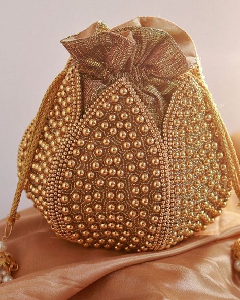 Shine bright with our Golden Beaded Potli Bag, perfect for adding a touch of luxury to any outfit. ✨ #PotliBag #Handcrafted #LuxuryFashion #ClutchesByRohika Potli Bag, Jewelry Illustration, Handmade Embroidery Designs, Potli Bags, Wedding Purse, Best Bags, Style Mistakes, Loom Beading, Shine Bright