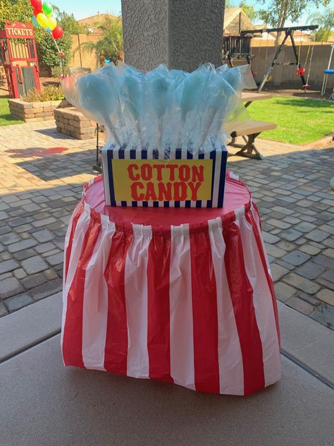 This set up was so easy to make as a cotton candy display. We wrapped a cardboard box in wrapping paper and cut spall holes at the top of the box to hold all of the yummy cotton candy. Cotton Candy Stand Display Diy, Cotton Candy Booth, Cotton Candy Display, Cotton Candy Stand, Birthdays Themes, Candy Booth, Circus Themed Birthday Party, Halloween Carnival Games, Rental Ideas