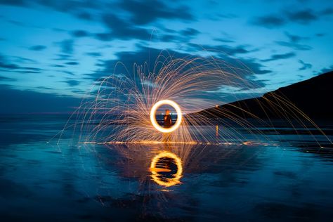 person in front of fire ring during nighttime photo – Free Steel wool photography Image on Unsplash Wool Photography, Steel Wool Photography, Lego Wallpaper, Free High Resolution Photos, Fire Photography, Happy New Years Eve, Steel Wool, Venture Capital, Man Photo