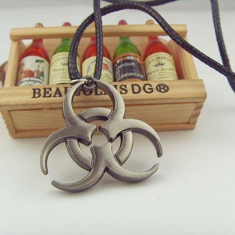 NIANA Biohazard Resident Evil necklace Movie Jewelry SN in ancient logo Pendant leather chain Ancient Logo, Evil Necklace, Resident Evil Umbrella, Movie Jewelry, Umbrella Corporation, Leather Chain, Resident Evil, Disease, Umbrella