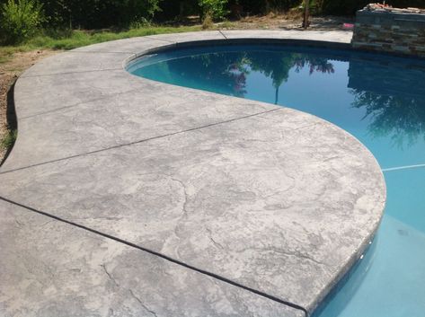 Textured Concrete Pool Deck, Cool Decking Pool Colors, Pool Concrete Deck Ideas, Stamped Concrete Around Pool, Concrete Pool Coping, Concrete Around Pool, Slate Stamped Concrete, Pool Hardscape, Painted Pool Deck