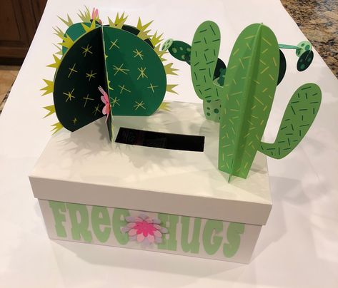 Cacti Valentine's Day Box. This was created with the Cricut Maker and Cricut Design Space. I used the 3D Cactus Love Images. I added the flowers. Top Image of Box Valentines Day Box Ideas, Cool Valentine Boxes, Girls Valentines Boxes, Valentine Boxes For School, Diy Valentines Box, Kids Valentine Boxes, Valentine Card Box, Valentine Mailbox, Diy Valentine's Day Decorations