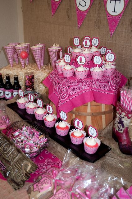 Incredible dessert table at a pink cowgirl party!  See more party ideas at CatchMyParty.com! Cowgirl Cake Table Ideas, Pink Cowgirl Dessert Table, Pink Cowgirl 1st Birthday Party, Pink Western Party Ideas, Pink Rodeo Cake, Pink Cowgirl Cupcakes, Cowgirl Table Decorations, Pink Western Party Decorations, Cowgirl Dessert Table Ideas