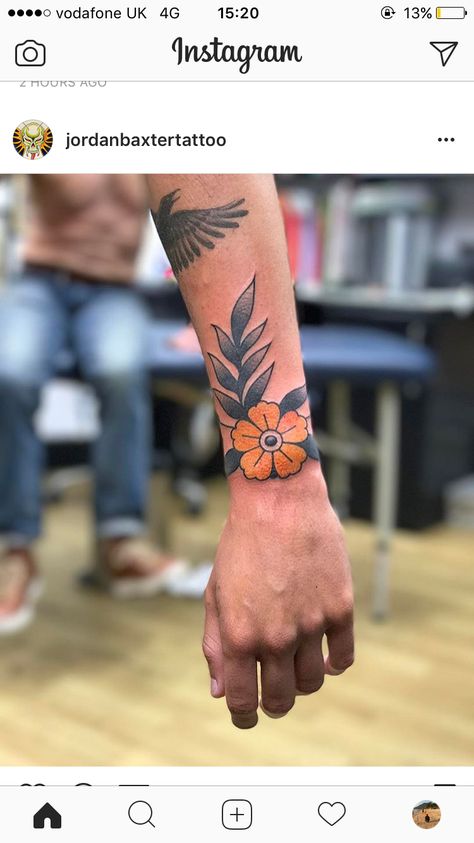 Traditional flower wrist tattoo Traditional Flower Tattoo Men, Wrist American Traditional Tattoo, American Traditional Wrist Band Tattoo, Trad Wrist Tattoo, Traditional Wrist Tattoos For Women, Old School Wrist Tattoo, Wrist Tattoo Traditional, Traditional Wrist Cuff Tattoo, Wrist Tattoos Traditional