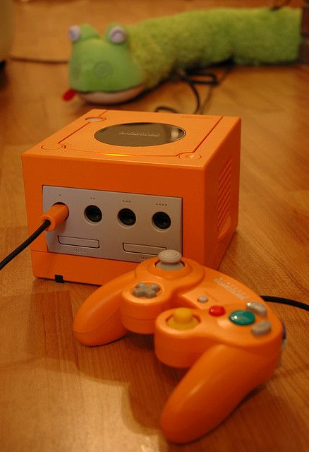 http://www.flickr.com/photos/woodrew/149393444/in/faves-apriloaks/ Orange Video Game Aesthetic, Orange Gaming Aesthetic, Game Cube Aesthetic, Orange Games, Nerd Aesthetic, Vintage Video Games, Retro Videos, Game System, Orange Aesthetic