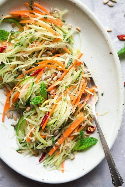 13 Thai-Inspired Side Dishes to Spice Up Your Meal #purewow #international #recipe #side dish #easy #food Thai Side Dishes, Green Papaya Salad, Vegetable Spring Rolls, Thai Salads, Green Papaya, Light Salad, Papaya Salad, Sweet Potato Soup, Vegan Salad