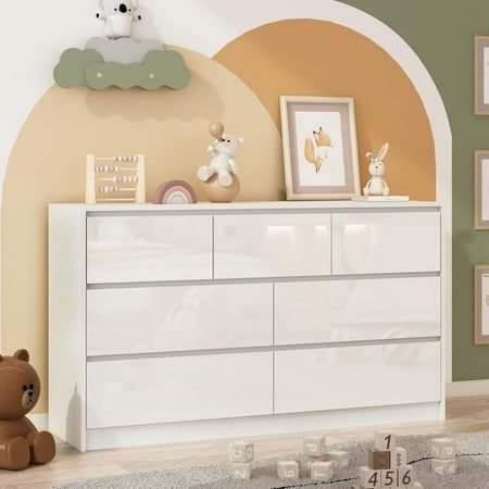 About this item Different from ordinary long chests of drawers, our white 7 drawers dresser for bedroom has a high-gloss front, adding a charming touch to your room. The unique beveled design of the drawers is full of modern elements. This high gloss dresser can be matched with various themed homes Overall dimensions55.1"D x 15.7"W x 31.5"H. Drawers dimensions: 26.8"D x 11.8" W x 8.7"H and 17.8"D x 11.8" W x 8.7"H. There are 4 large and 3 medium drawers to easily organize your belongings and hel Free Dresser, Malm Dresser, Large Chest Of Drawers, Long Living Room, Long Dresser, Bedroom Chest Of Drawers, Dresser For Bedroom, 7 Drawer Dresser, 9 Drawer Dresser