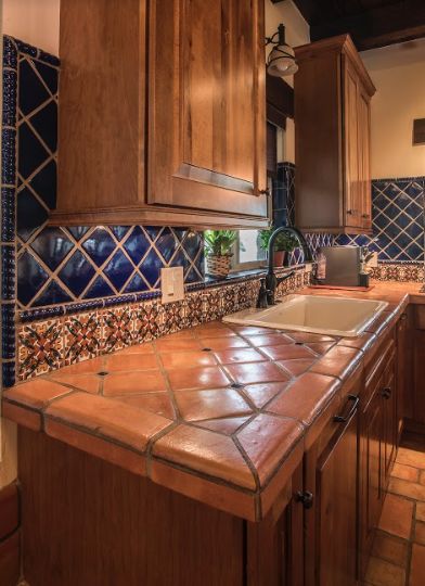 We have created a fabulous decorative tile backsplash with a saltillo counter top. #pradoshandcraftedtilestudio #mexicantileandstone #customtile #saltillotile #kitchendesign #interiordesign #backsplashdesign #countertops #customfloors #azdesigns www.mexicantileandstone.com Hacienda Kitchen Decor, Mexican Kitchen Design, Tile Counter Tops, Mexican Tile Kitchen, Mexican Home Design, Mexican Style Kitchens, Hacienda Kitchen, Spanish Style Kitchen, Tile Countertops Kitchen