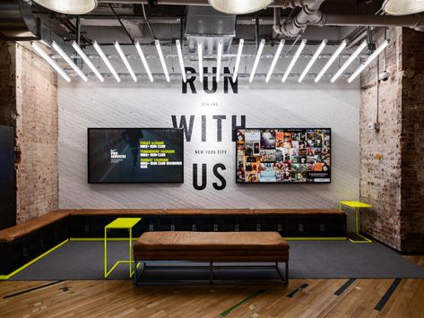 Exposed and White Brick Seating Area with Flourescent Lighting, Flatiron - David Brady Nike Office, Brick Wall Ideas, Nike Retail, Gym Interior, Gym Room, Media Wall, Retail Interior, Gym Design, White Brick