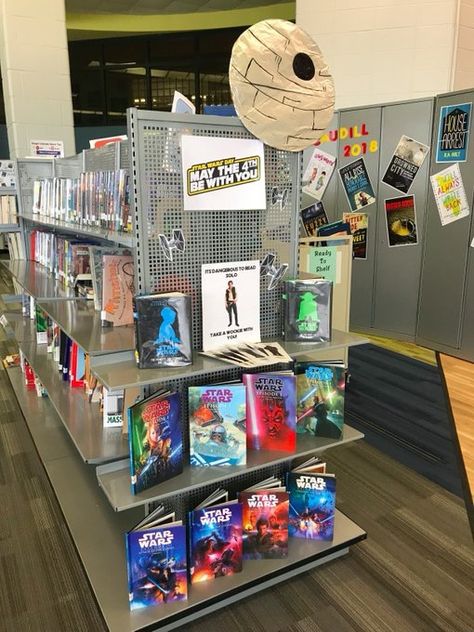 Library Decorations: Library End Cap: Star Wars Theme for May the Fourth Cap Inspiration, Library Decorations, May The Fourth, Cap Decorations, Library Decor, Public School, Gaming Products, Star Wars, Shelves