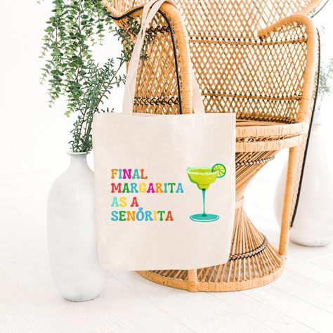 Elevate your bachelorette party style with our chic tote bags! Perfect for carrying all your essentials while celebrating with your squad. Stylish, practical, and definitely photo-worthy. #bacheloretteparty #totebag #bridetribe #girlsnightout #maidofhonor #bridesmaids #partyfavors #weddingseason #bridalparty #celebrategoodtimes Margarita Design, Bachelorette Tote Bags, Last Fling Before The Ring, Mexico Bachelorette, Bachelorette Tote, Bridal Squad, Stylish Tote Bag, Get The Party Started, Free Birthday Invitations