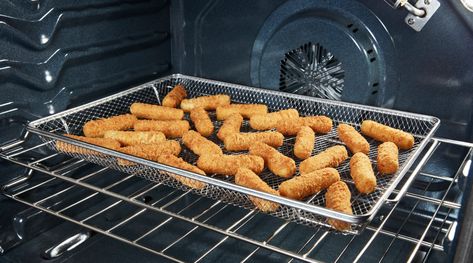 Using Aluminum Foil in an Air Fryer: How-To Guide | Whirlpool Whirlpool Oven Air Fryer Recipes, Innsky Air Fryer Oven Recipes, Oven Vs Air Fryer Time, Chicken In Aluminum Foil Oven, Ninja Foodi 10-in-1 Xl Pro Air Fry Oven, Crispy Chicken Tenders, Iron Grate, Gas Range, Air Frying