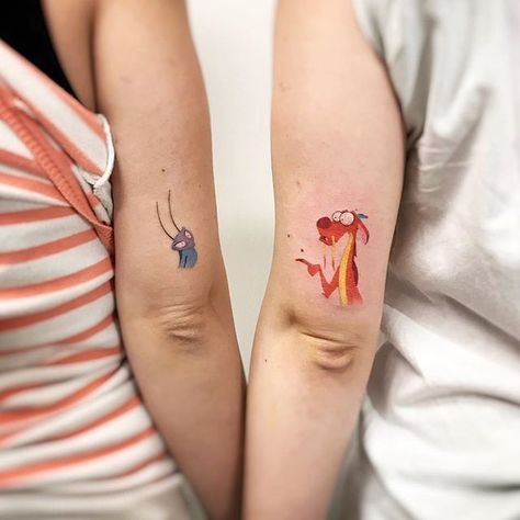 Mulan Cricket Tattoo, Colorful Cartoon Tattoos, Disney Friends Tattoo, Mushu Mulan Tattoo, Tattoos Ideas For Best Friends, Disney Tattoo Inspiration, Mushu And Cricket, Mushu Tattoo, Best Matching Tattoos