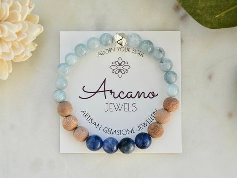 "DIFFUSER | mermaid Truth + Intuition ️ Cute & chic Aromatherapy Essential Oil Diffuser Bracelet with aquamarine & sodalite Simply add 1-2 drops of your favorite essential oil to the ROSE WOOD & enjoy the therapeutic benefits of your oil all day long! Enjoy FREE SHIPPING when you purchase two (2) or more items from the shop! 🙌 MATERIALS: 8 mm ~ rose wood ~ sodalite gemstones ~ aquamarine gemstones STONE PROPERTIES:  Sodalite is associated with the sixth chakra, the third eye.  Focusing on self- Sixth Chakra, Dark Mermaid, Boho Travel, Stone Properties, Mermaid Bracelet, Oil Diffuser Bracelet, Essential Oil Diffuser Bracelet, Rose Wood, Crystal Healing Stones