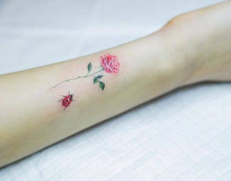 Small pink rose and ladybug tattoo on the inner forearm. Small Nature Tattoo, Ladybug Tattoo, Pink Rose Tattoos, Lady Bug Tattoo, Small Forearm Tattoos, Insect Tattoo, Bug Tattoo, Delicate Tattoo, Memorial Tattoos