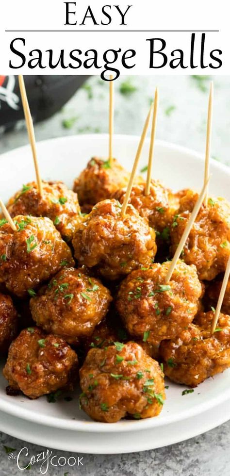 These spicy sausage balls come together with nothing more than cheddar, cream cheese, sausage, and bisquick! Make them ahead of time and keep them warm in the Crock Pot! #christmasappetizers #appetizerideas #fingerfood #newyearseverrecipes Spicy Sausage Balls, Best Sausage Ball Recipe, Easy Sausage Balls Recipes, Cream Cheese Sausage, Sausage Balls Bisquick, Sausage Balls Recipe, Sausage Meatballs, Sausage Balls, Cheese Ball Recipes