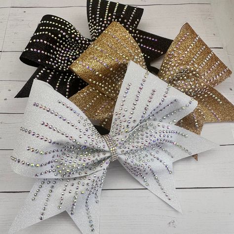 "These beautiful rhinestone burst cheer bows are great for cheer competitions, sideline cheer, dance, etc. The AB rhinestones are gorgeous and extremely sparkly. Bows are made on 3\" ribbon and measure approximately 7\"x6\" ----SHIPPING & PROCESSING--- ♥ Processing Time (the time it takes me to create your order) Pleas refer to my shop announcements and FAQ's for up to date processing time information. ♥ We ship packages Monday - Friday via USPS First Class mail and USPS Ground Mail for order exceeding one pound.  Upgraded shipping options are available and depend on the size of the package. Please contact me for a price.  ♥ Standard shipping takes 3-6 business days, priority shipping takes 2-4 business days, and Express shipping is guaranteed in 1-2 days.   ♥ Expatiated orders are by requ All Star Cheer Bows, Bling Cheer Bows, Competition Cheer, Competition Bows, Sideline Cheer, Team Cheer, Cheerleading Bow, School Cheer, Cheer Camp