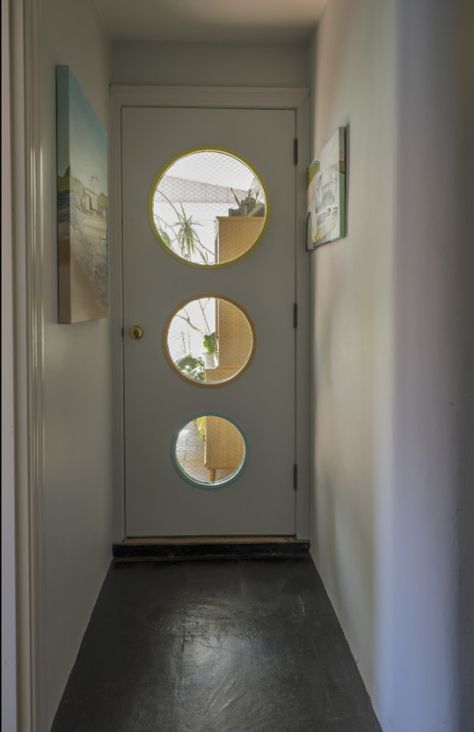 Back door is a work of art, with three port windows showing in descending size. Porthole Door, Mid Century Doors, Mid Century Modern Front Door, Cnc Door, Mid Century Modern Door, Entry Door Designs, Mid Century Exterior, Modern Exterior Doors, Mid Century Modern Home