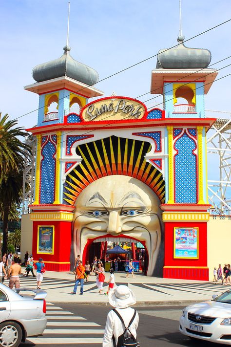 Entrance to the landmark Luna Park Melbourne - the oldest of the Luna Park franchise in Australia. Luna Park first opened in St Kilda in 1912. 2 of the attractions icons are the moon face entrance, and the original 1912 Scenic Railway roller-coaster. The main features of Luna Park, including its iconic moon face entrance are heritage listed by the national trust. Luna Park Melbourne, Door Ways, Luna Park, Fantasy Concept, Moon Face, St Kilda, National Trust, Roller Coaster, The National